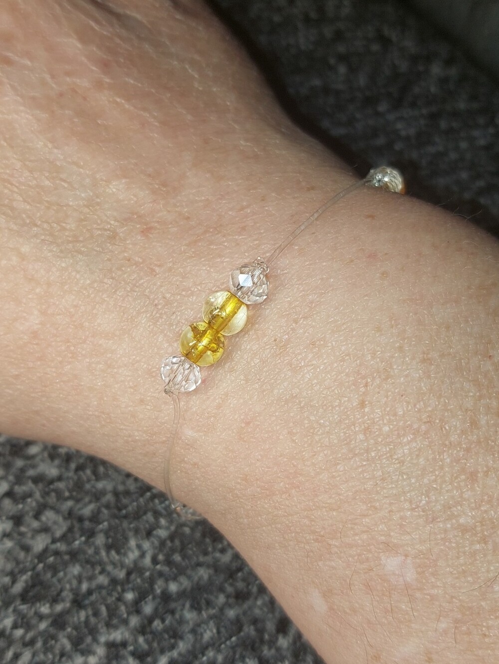 Delicate Yellow Floating Crystal Bead Bracelet - Invisible Thread